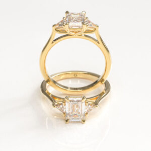Emerald & Trapezoid Trilogy Engagement Ring